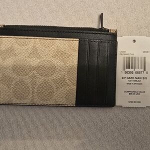 Coach Black and Tan Zip Card Maxi Wallet